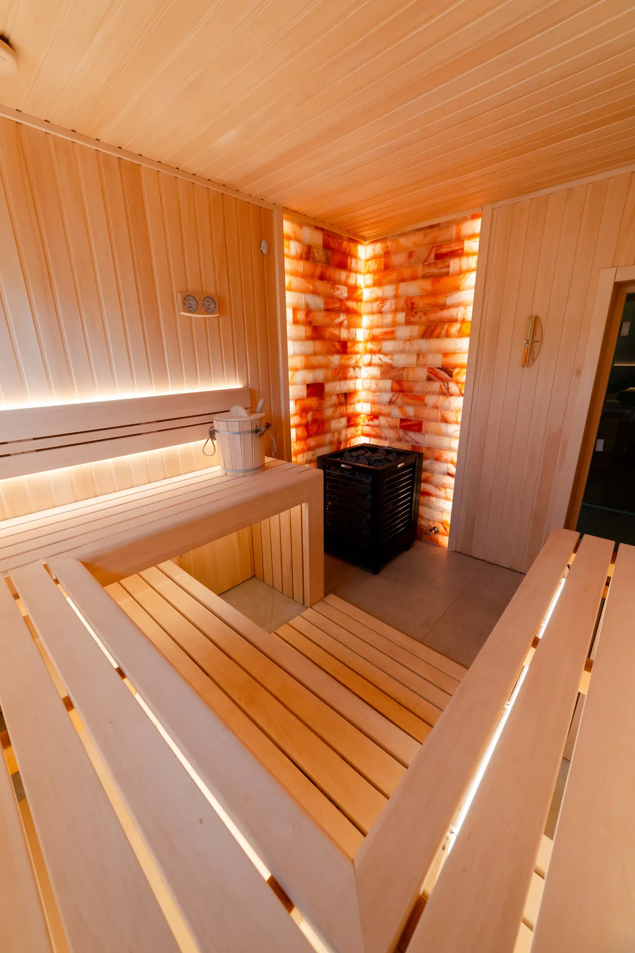 Sauna interior — wood and warm light — frame 5