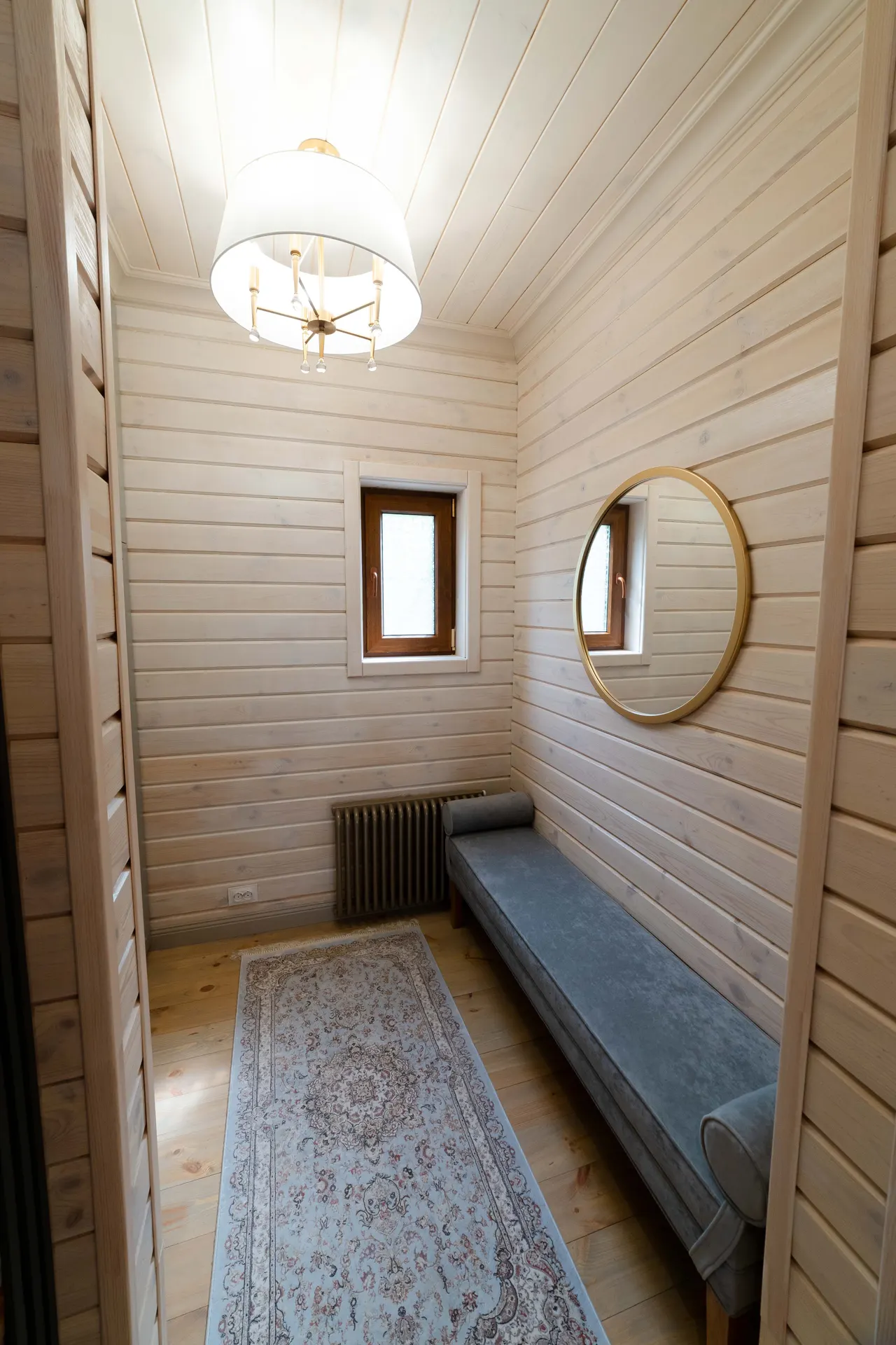 Sauna interior — wood and warm light — frame 4